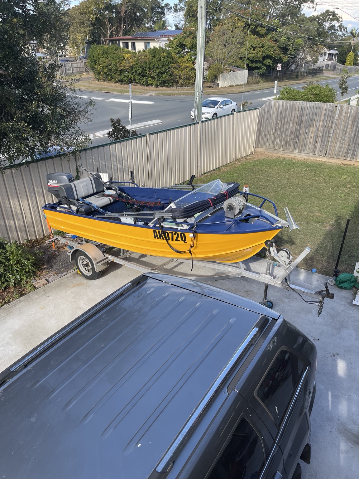 Refinished boat trailer with adjustable red roller system